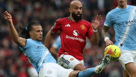 Michael Carrick  Bawa MU Belum Terkalahkan