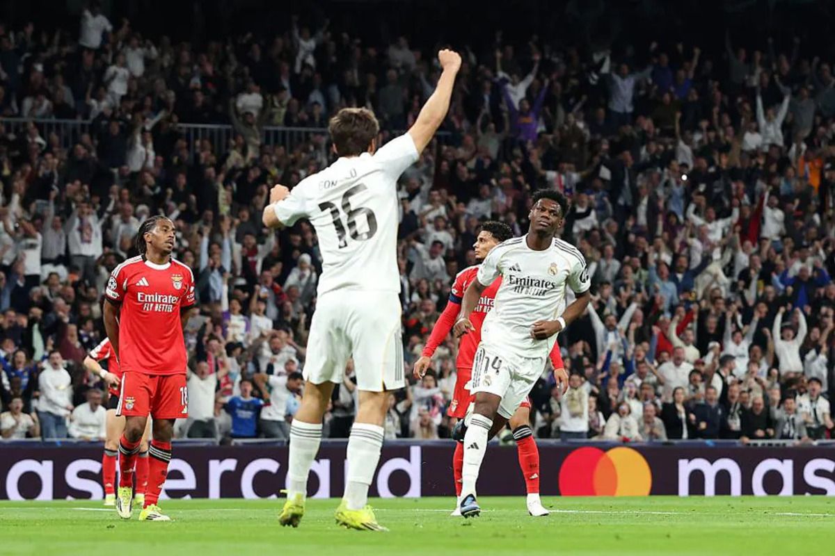 Real Madrid  ke 16 Besar Champions, Kalahkan benfica 2-1