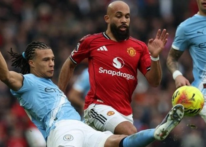 Michael Carrick  Bawa MU Belum Terkalahkan