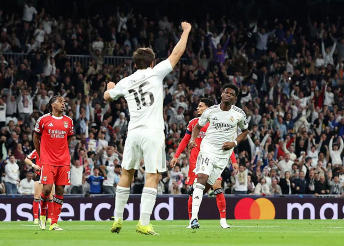Real Madrid  ke 16 Besar Champions, Kalahkan benfica 2-1